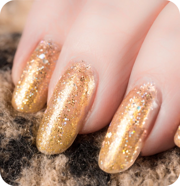 Glitters gold nail polish